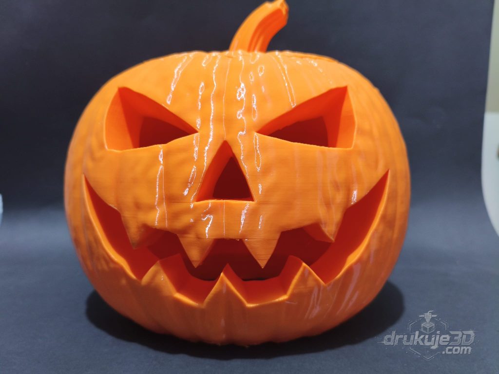 Pomarańczowa dynia halloweenowa z druku 3D o wysokości 24 cm, z wyciętą twarzą i podświetleniem od środka