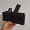 Czarny organizer na piloty z trzema przegrodami i ażurowymi ściankami, wydruk 3D z PETG