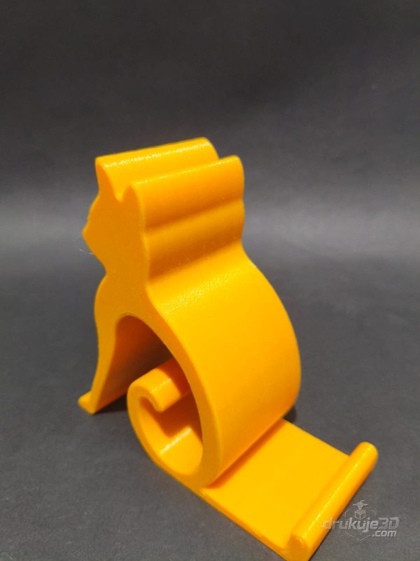 Żółta podstawka pod telefon w kształcie sylwetki siedzącego kota, wydruk 3D z PETG Żółta podstawka pod telefon w kształcie sylwetki siedzącego kota, wydruk 3D z PETG